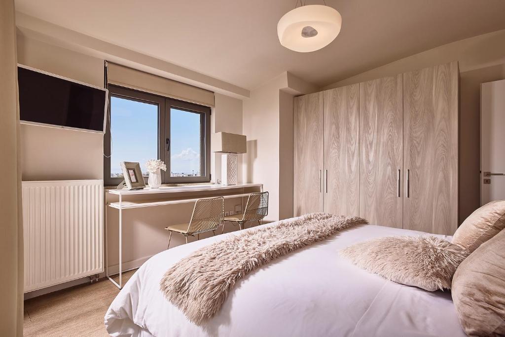 Posteľ alebo postele v izbe v ubytovaní Elaia Luxury Apartments Glyfada