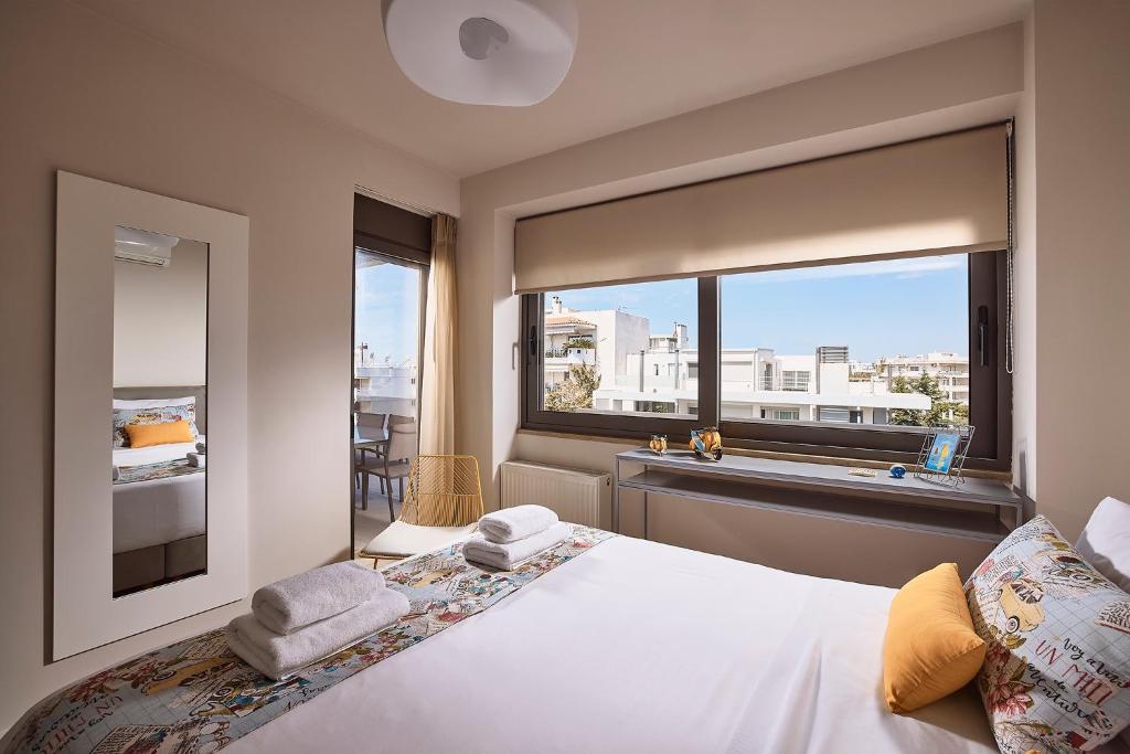 Posteľ alebo postele v izbe v ubytovaní Elaia Luxury Apartments Glyfada