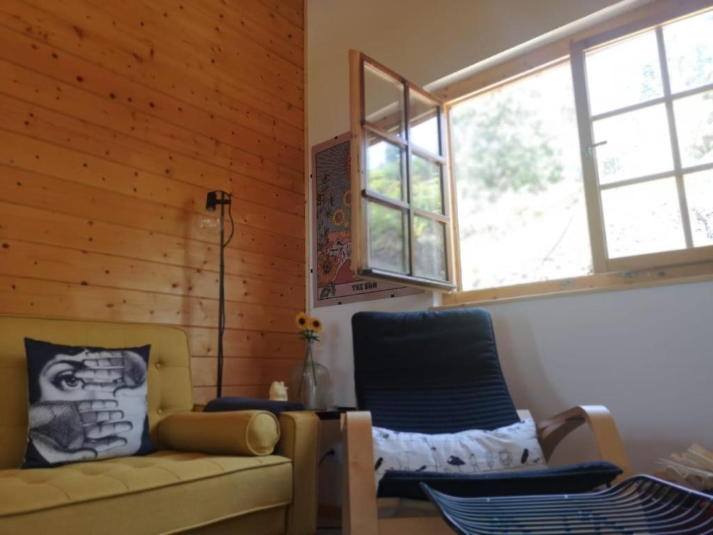 Posezení v ubytování Cabaninha de Cabana Maior