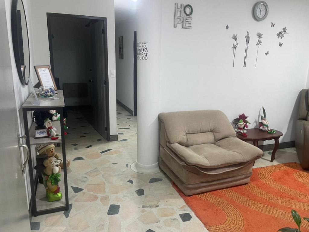 Гостиная зона в Room cerca al aeropuerto