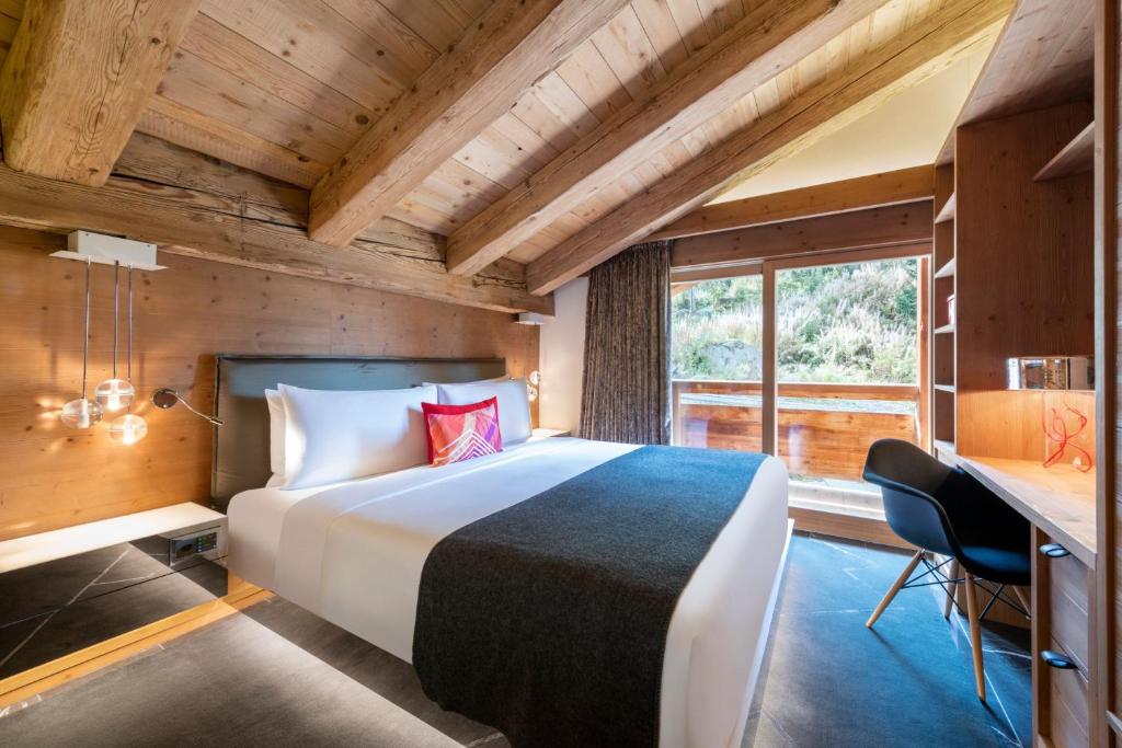 Postel nebo postele na pokoji v ubytování W Verbier