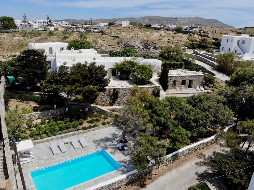 an aerial view of a villa with a swimming pool at Traditional villa with swimming pool in Ano Mera