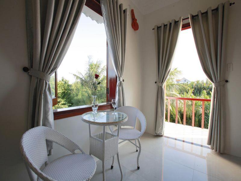 Rõdu või terrass majutusasutuses Coconut Garden Homestay