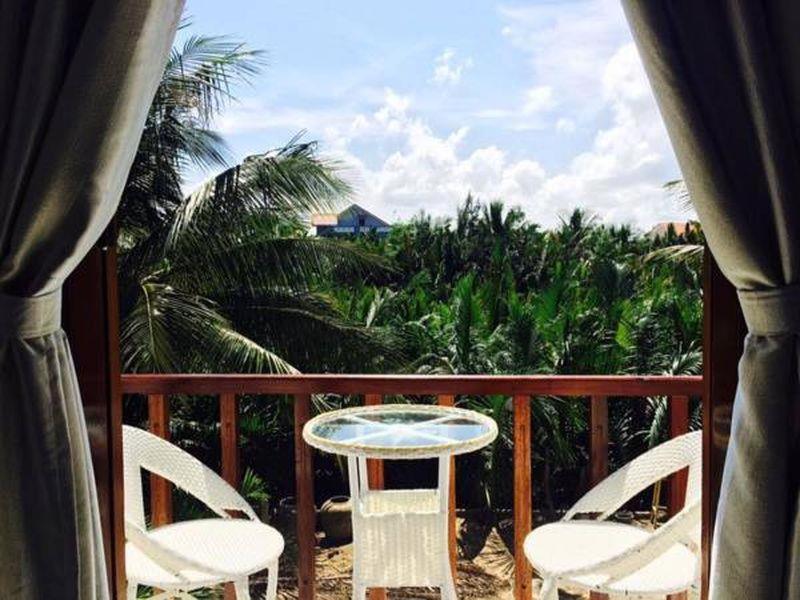 Rõdu või terrass majutusasutuses Coconut Garden Homestay
