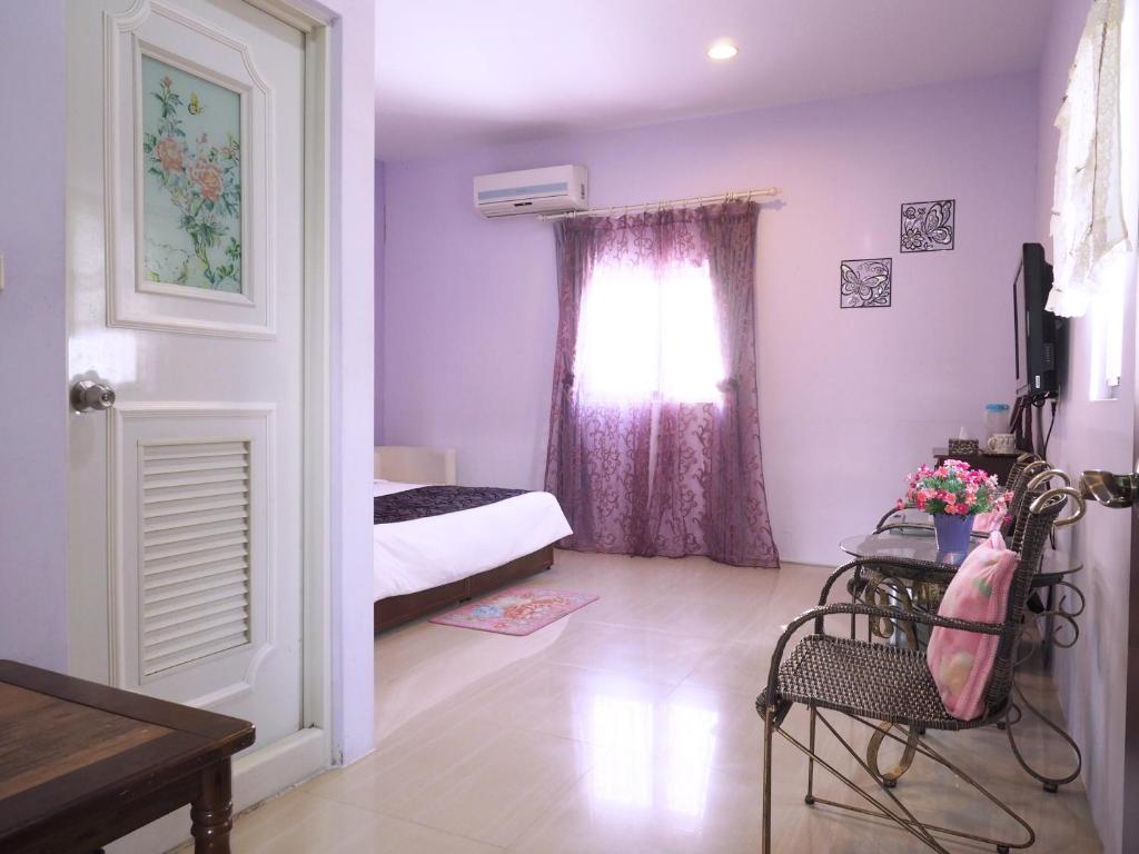 Postel nebo postele na pokoji v ubytování Siang Ti Ya Homestay