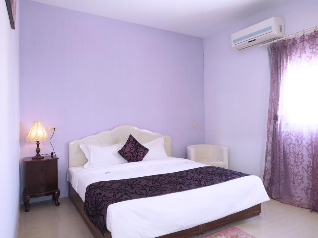 Postel nebo postele na pokoji v ubytování Siang Ti Ya Homestay