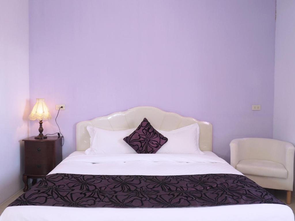 Postel nebo postele na pokoji v ubytování Siang Ti Ya Homestay