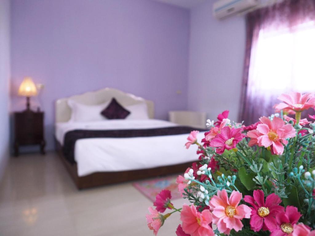 Postel nebo postele na pokoji v ubytování Siang Ti Ya Homestay