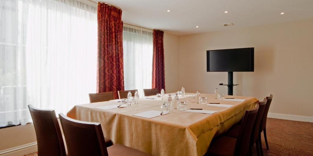 TV a/nebo společenská místnost v ubytování Gresham Belson Hotel Brussels