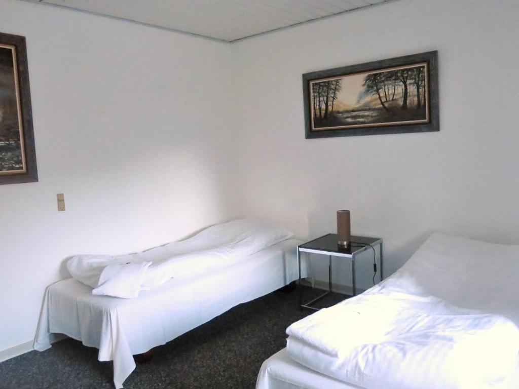 Postel nebo postele na pokoji v ubytování Centrum Sleepover