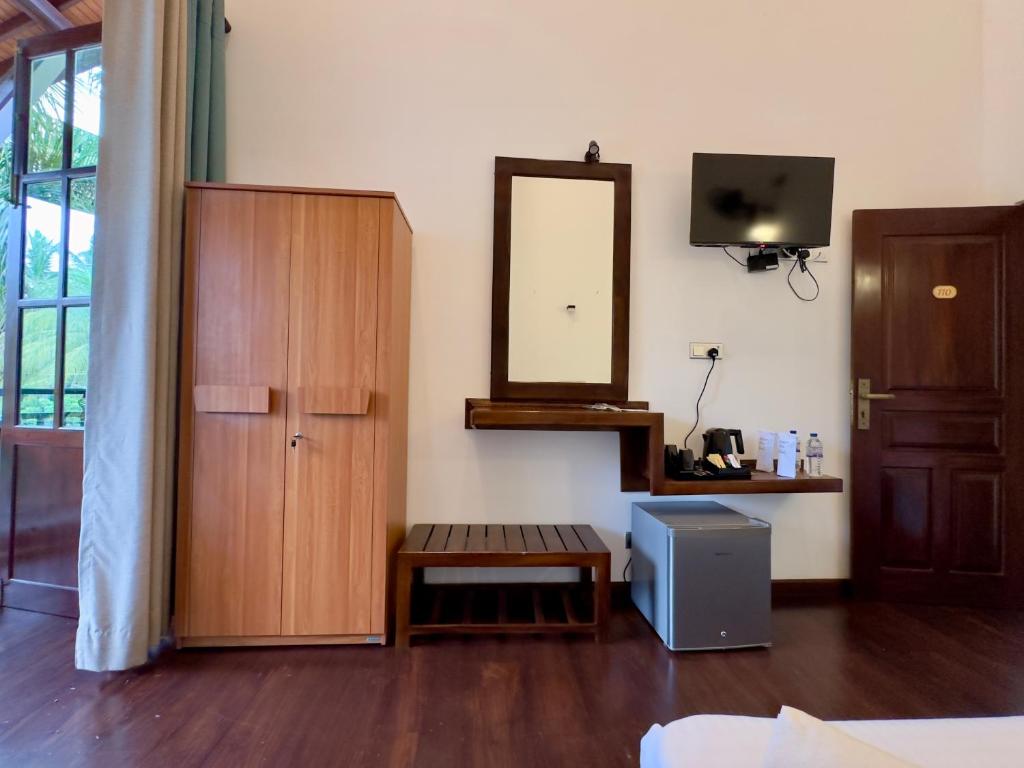 Postel nebo postele na pokoji v ubytování Even Beach Resort