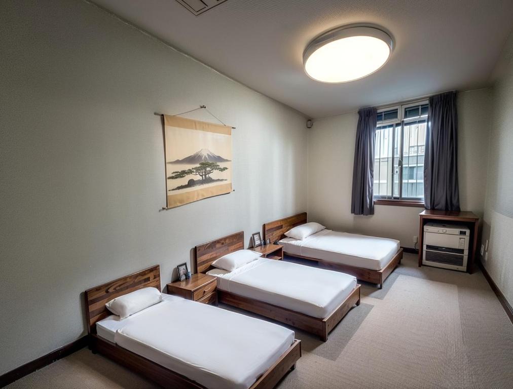 Postel nebo postele na pokoji v ubytování Wonderwall美好境界 日本苗場館