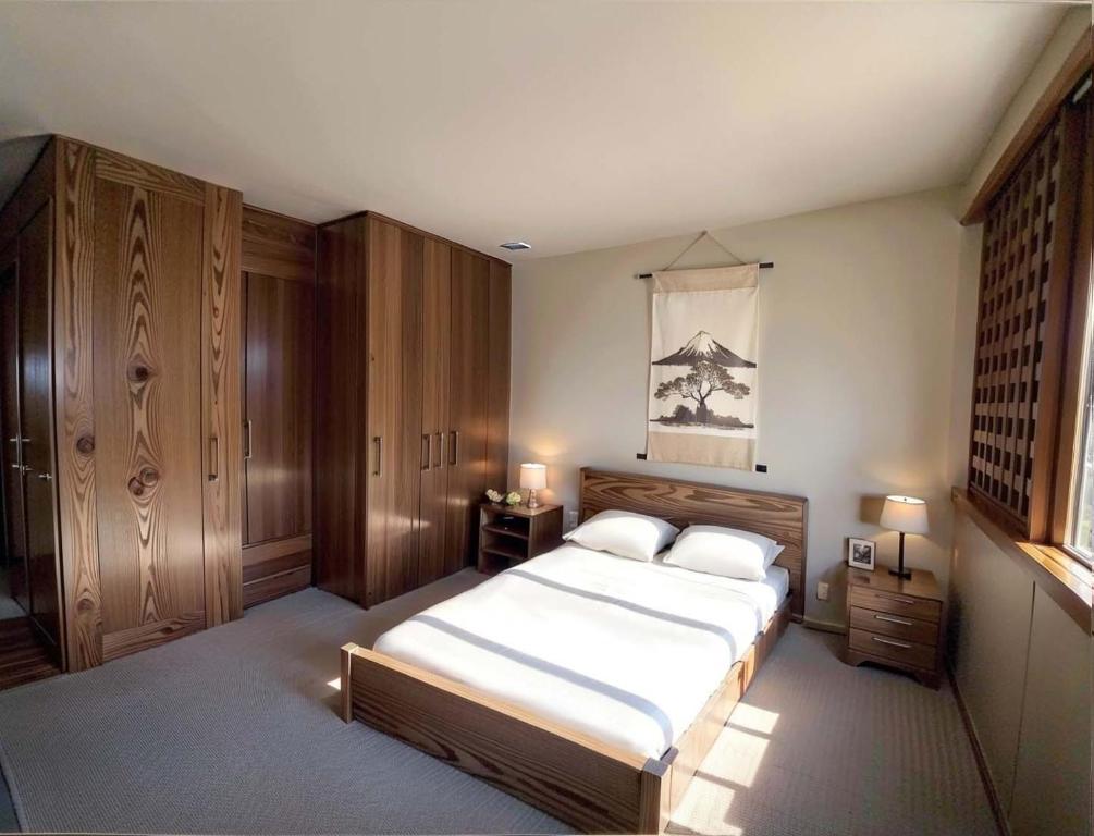 Postel nebo postele na pokoji v ubytování Wonderwall美好境界 日本苗場館