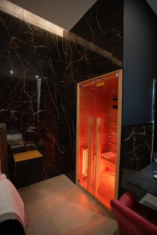 Posteľ alebo postele v izbe v ubytovaní Nuar suite&spa