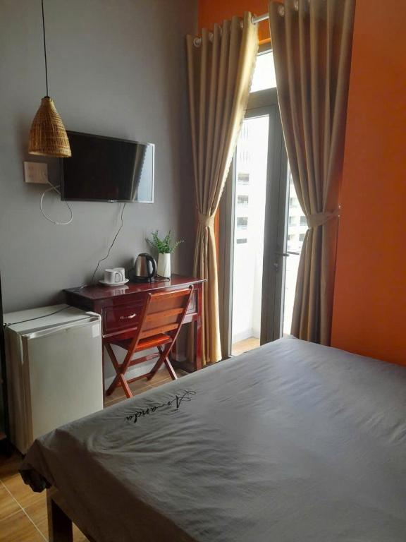 Postel nebo postele na pokoji v ubytování Thanh Hằng Homestay