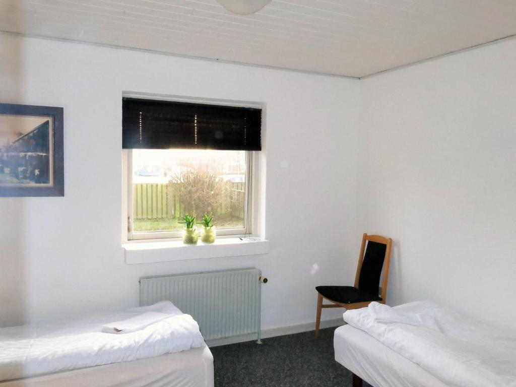 Postel nebo postele na pokoji v ubytování Centrum Sleepover