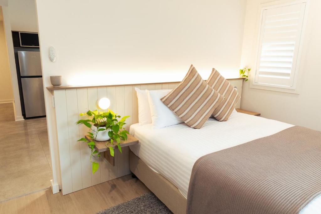 Postel nebo postele na pokoji v ubytování Lismore Gateway Motel