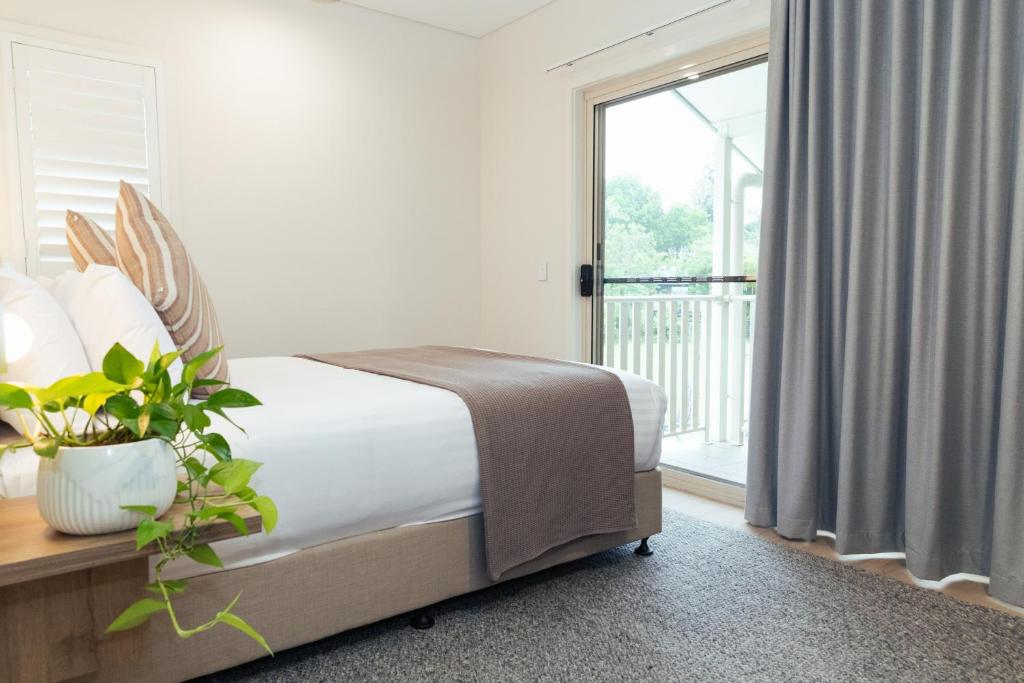 Postel nebo postele na pokoji v ubytování Lismore Gateway Motel