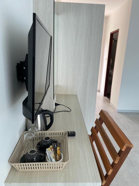 TV a/nebo společenská místnost v ubytování Lanta Corsica Hotel