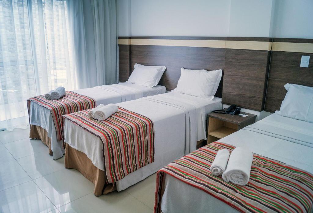 Cama ou camas em um quarto em Val Atlantic Hotel