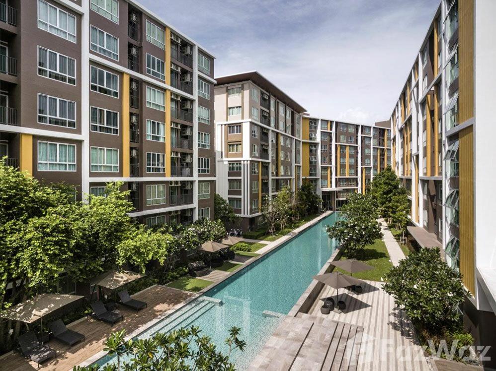 an image of an apartment complex with a swimming pool at Dcondo campus resort Bangsaen in Ban Rong Khoei