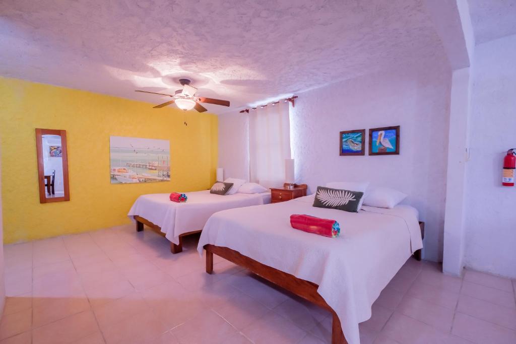 Cama o camas de una habitación en Seven Seas Resort Adults Only