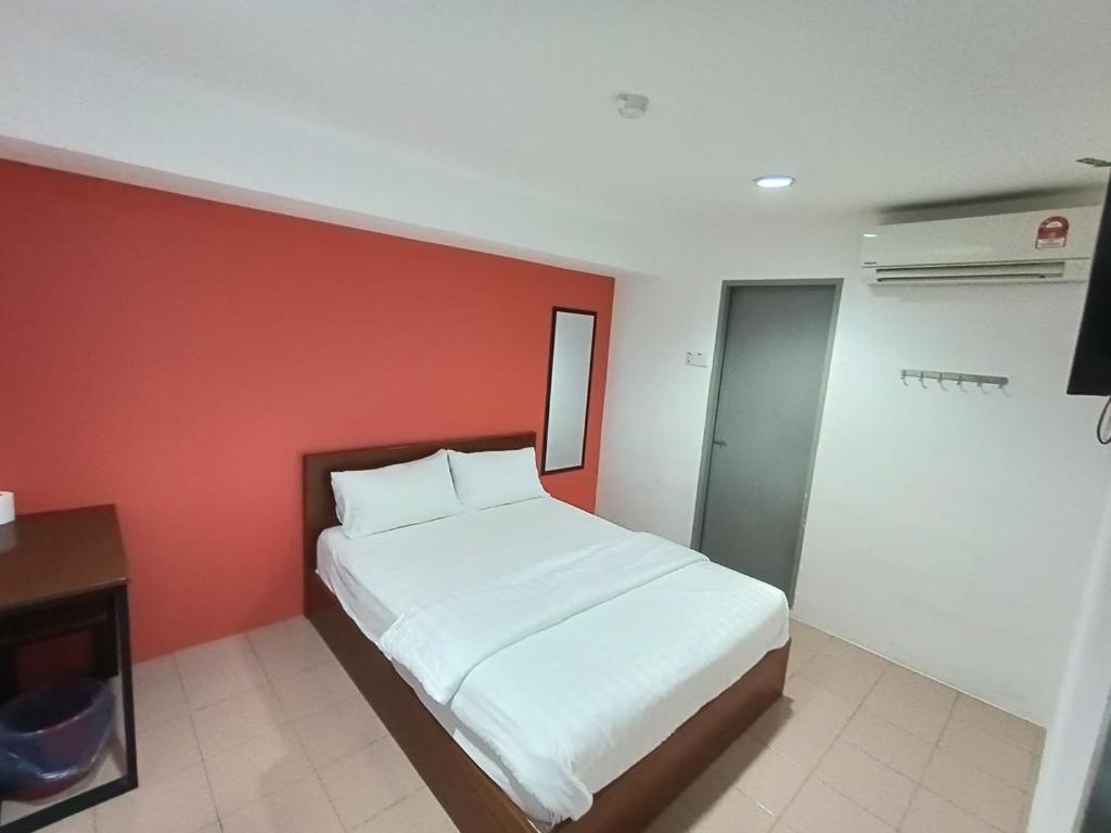 Postel nebo postele na pokoji v ubytování Lux Hotel
