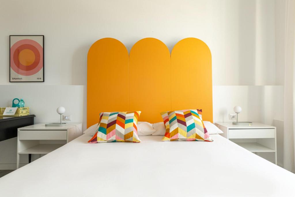 A bed or beds in a room at Spacebility City - self check-in