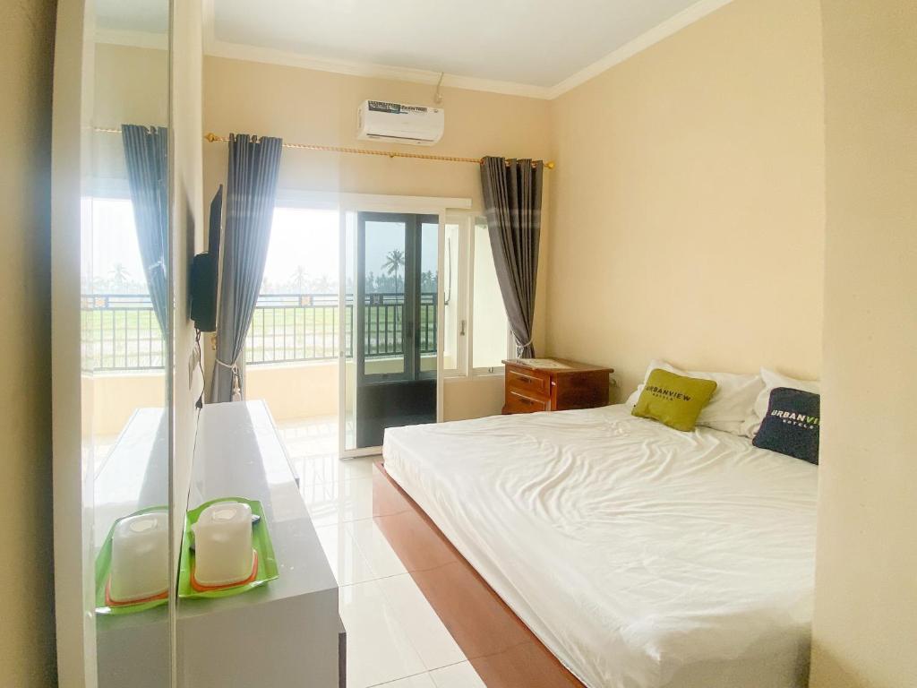Urbanview Griya Lota Guest House Banyuwangi - Habitación Doble Superior