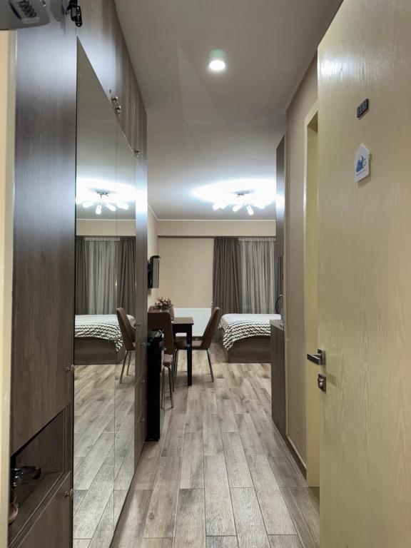 Postel nebo postele na pokoji v ubytování Giorgi Apartment In New Gudauri - Block 3 - N315