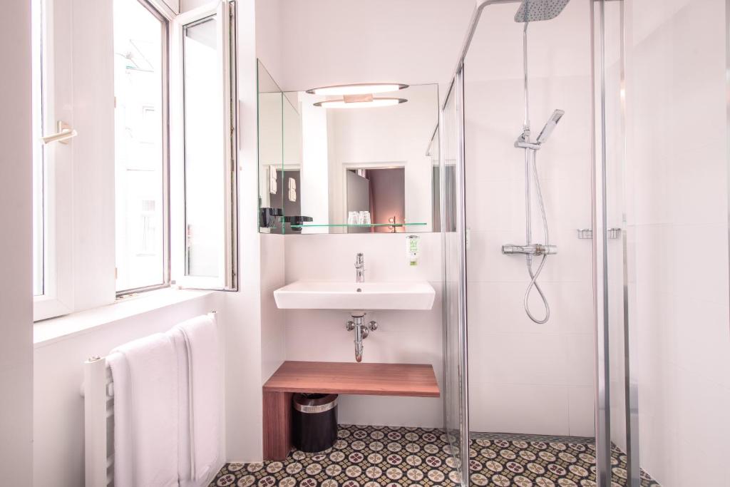 Kúpeľňa v ubytovaní BoutiqueHOTEL Donauwalzer