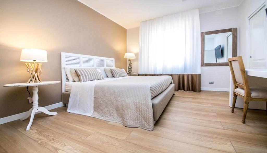 Llit o llits en una habitació de Maxim