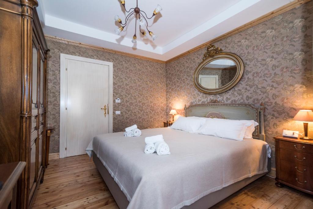 Postel nebo postele na pokoji v ubytování Càdor Hotel