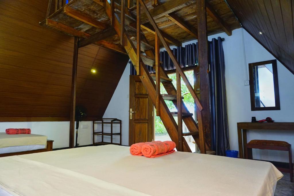 Postel nebo postele na pokoji v ubytování Sky Villa Sigiriya