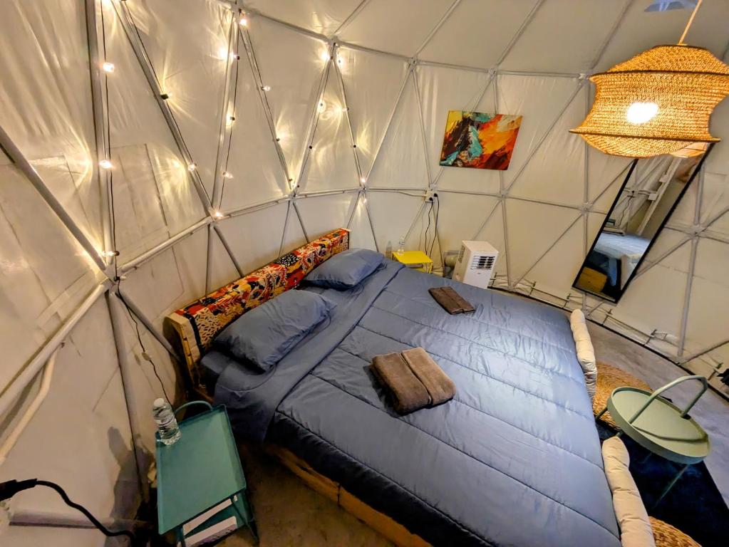 Postel nebo postele na pokoji v ubytování Vanara Bungalows