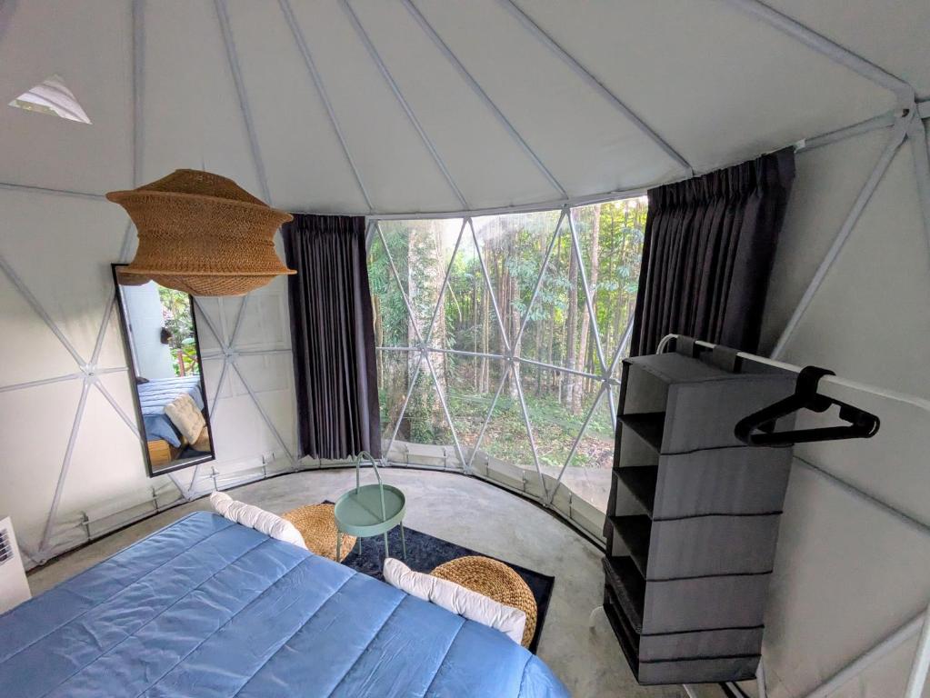 Postel nebo postele na pokoji v ubytování Vanara Bungalows