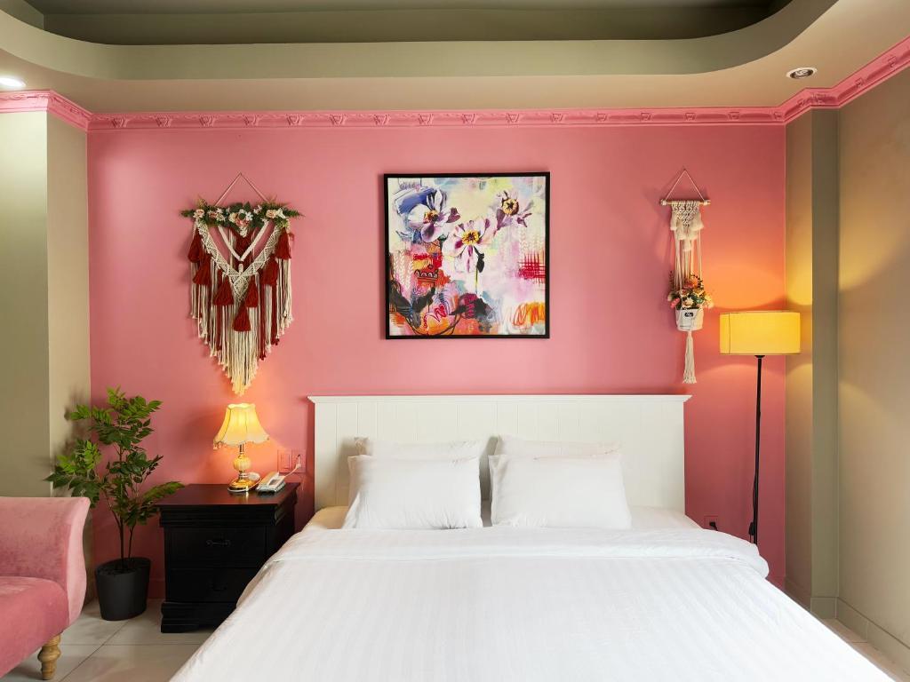 Giường trong phòng chung tại La Casona Hotel