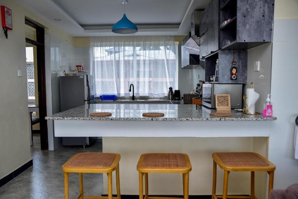 Η κουζίνα ή μικρή κουζίνα στο Hawas Loft - Nakuru Kiamunyi