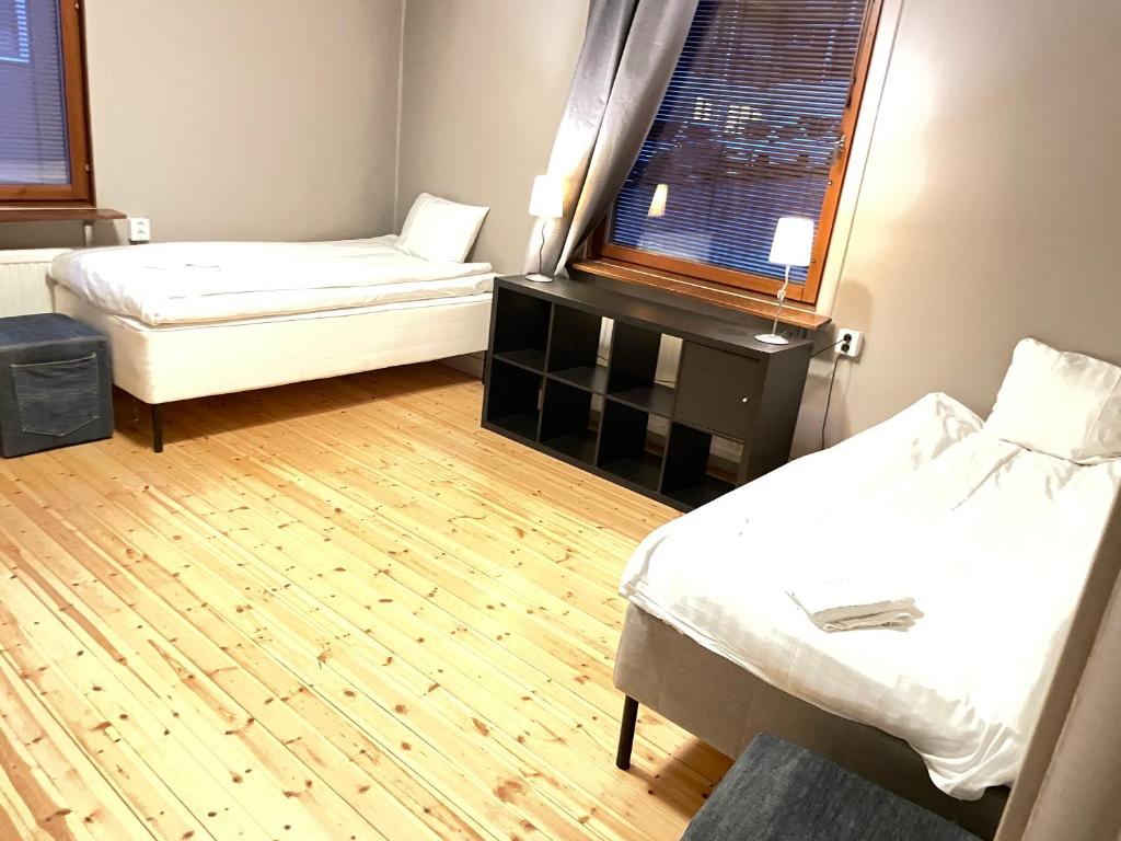 Postel nebo postele na pokoji v ubytování Park Hotell