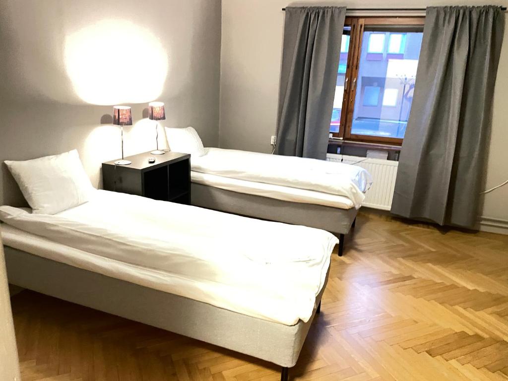 Postel nebo postele na pokoji v ubytování Park Hotell