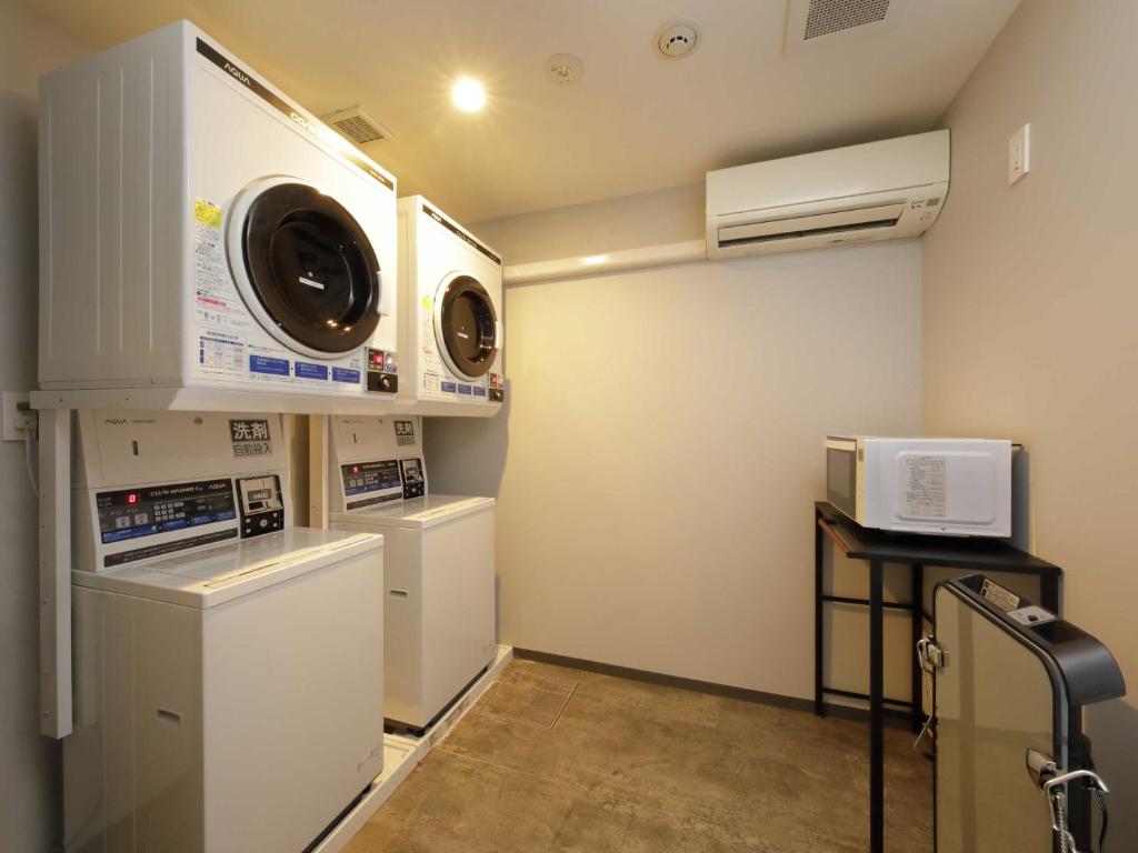 Kuchyň nebo kuchyňský kout v ubytování Smart Place Inn Kyoto Nijojo-mae Station