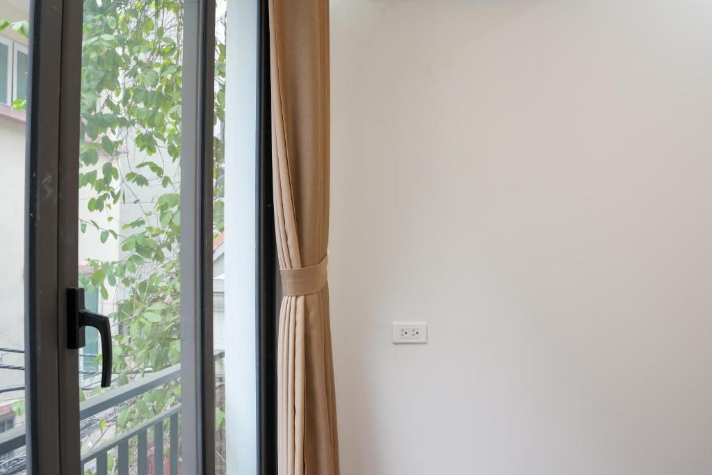 Fotografie z fotogalerie ubytování NINE HOUSING 49 Linh Lang v Hanoji