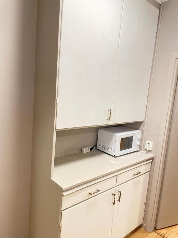 Kuchyň nebo kuchyňský kout v ubytování Park Hotell