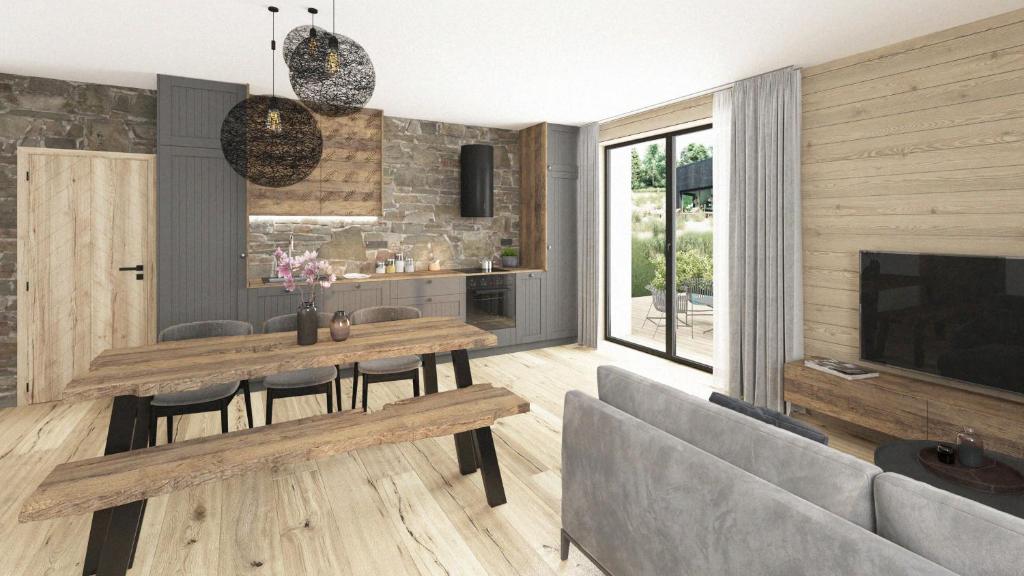 TV a/nebo společenská místnost v ubytování Apartmány Hraničná s privátním wellness