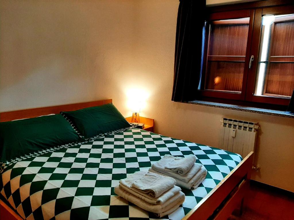 Postel nebo postele na pokoji v ubytování CIVICO 43 Interno 6