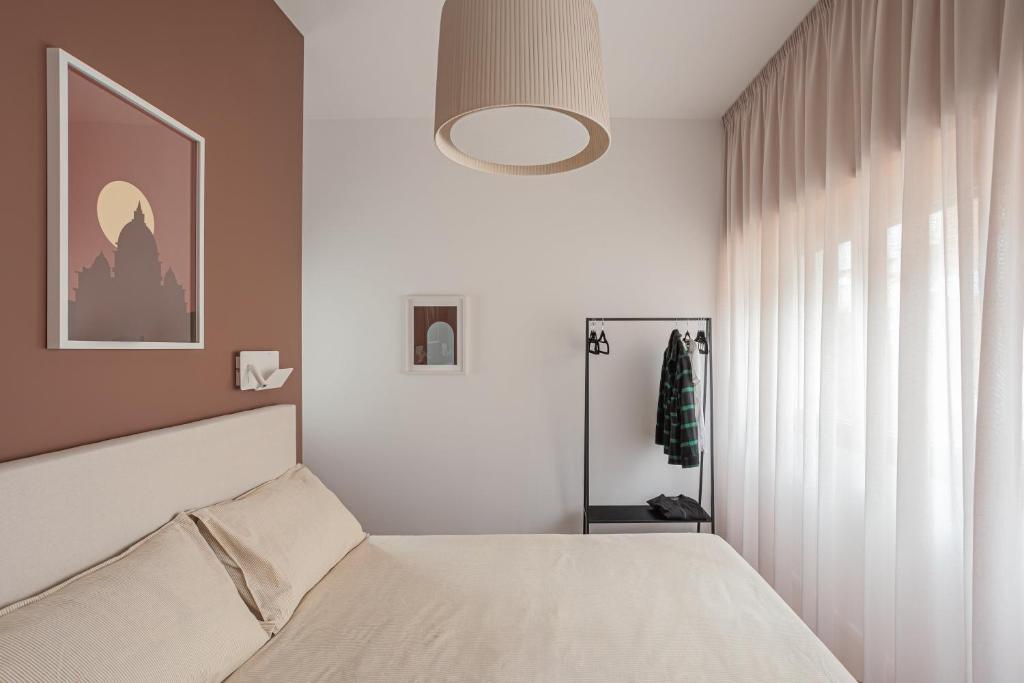 Postel nebo postele na pokoji v ubytování 4BNB - Suites del Gallo