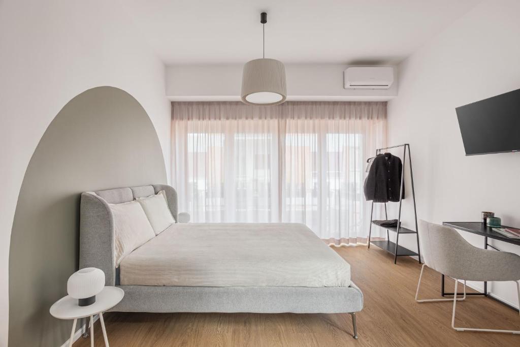 Postel nebo postele na pokoji v ubytování 4BNB - Suites del Gallo