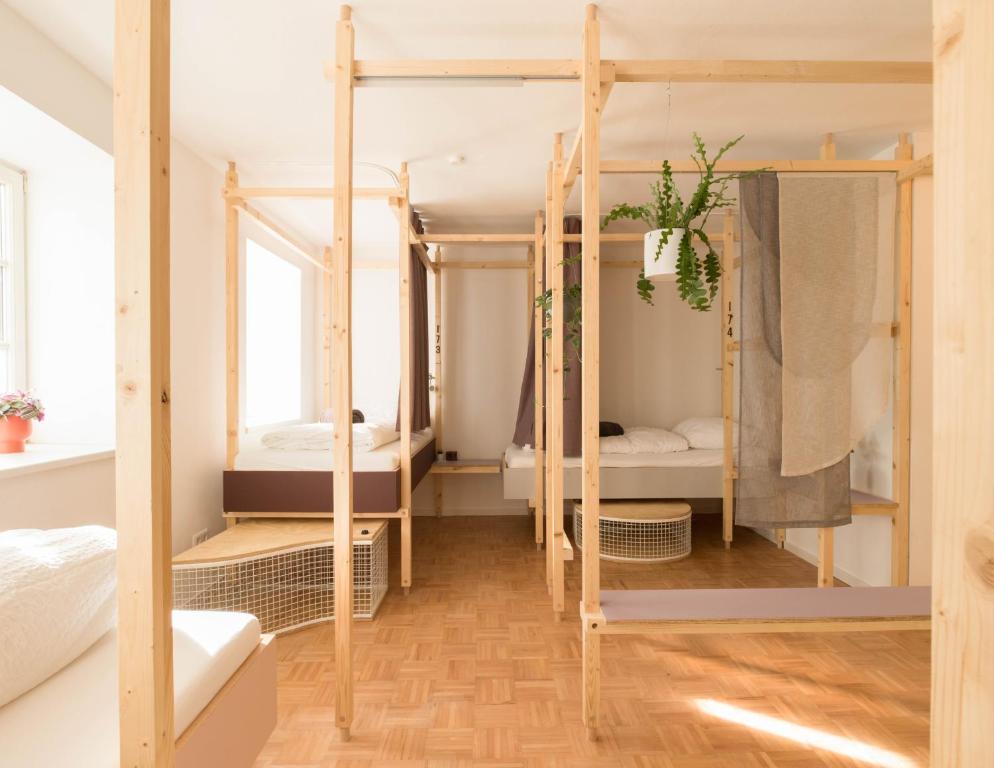 Postel nebo postele na pokoji v ubytování Montagu Hostel