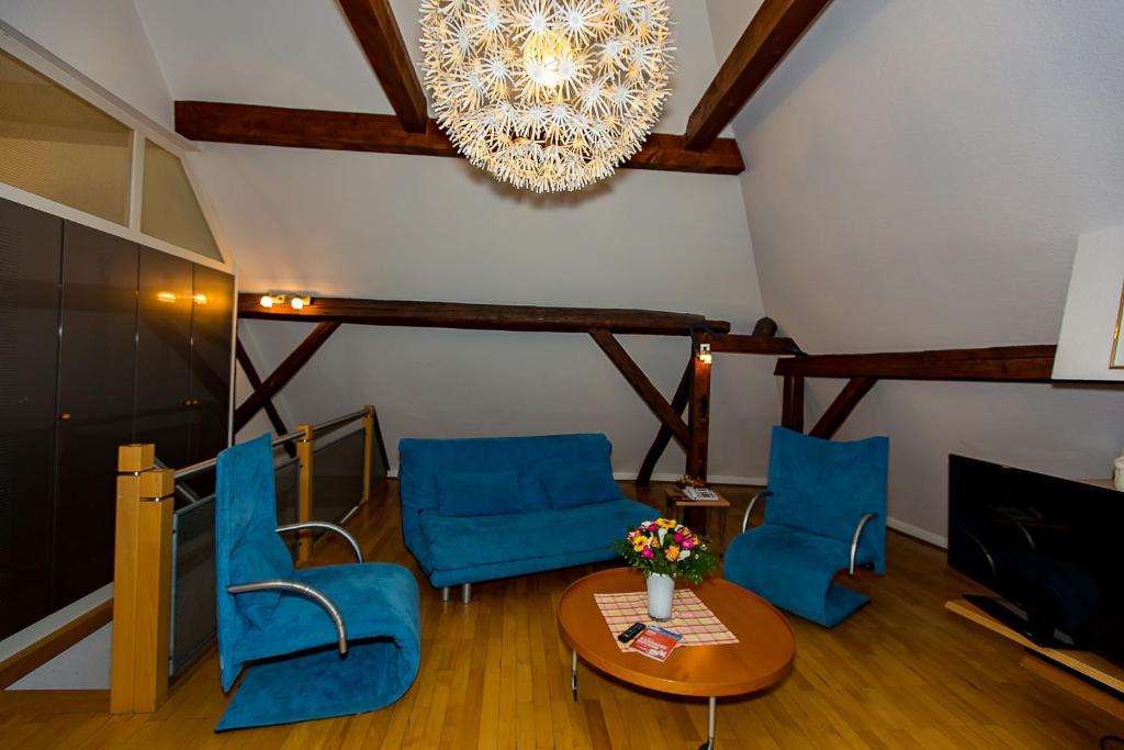 Posezení v ubytování Hotel Goldener Falke