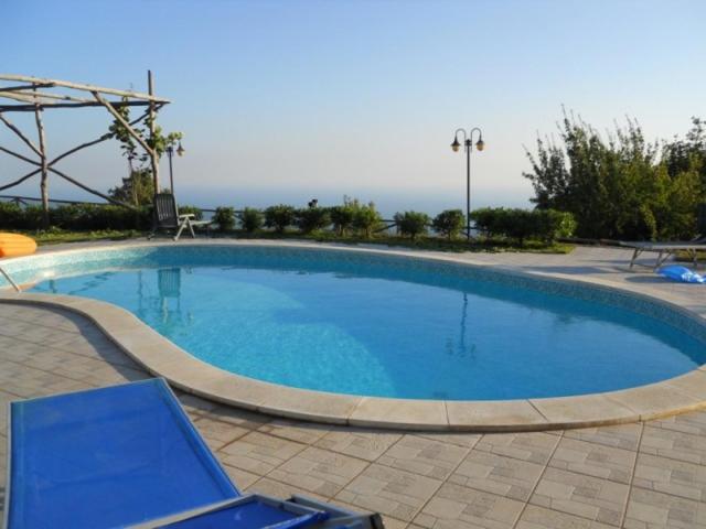 The swimming pool at or close to VILLA PIETRALTA
